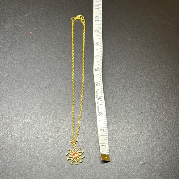 Red Gem Gold Starburst Necklace - Picture 2 of 2